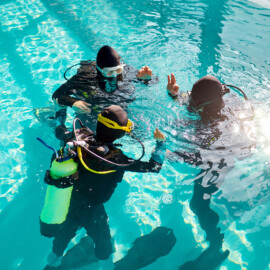 Scuba instructor and students
