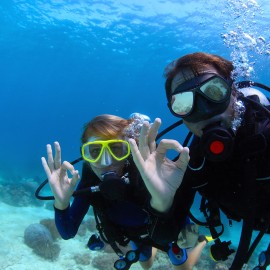 Divers practice safety and show they are ok.