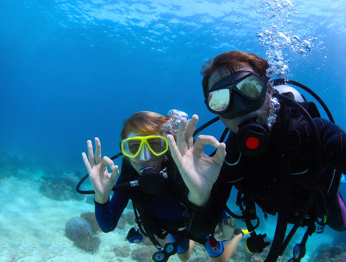 Divers practice safety and show they are ok.